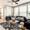 living room with a large window and open spaces