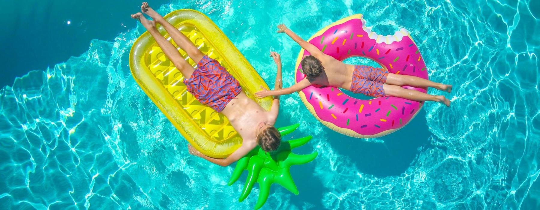 a group of kids in a pool