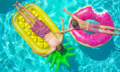 a group of kids in a pool