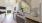 a kitchen with marble counters