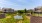 a pond surrounded by houses