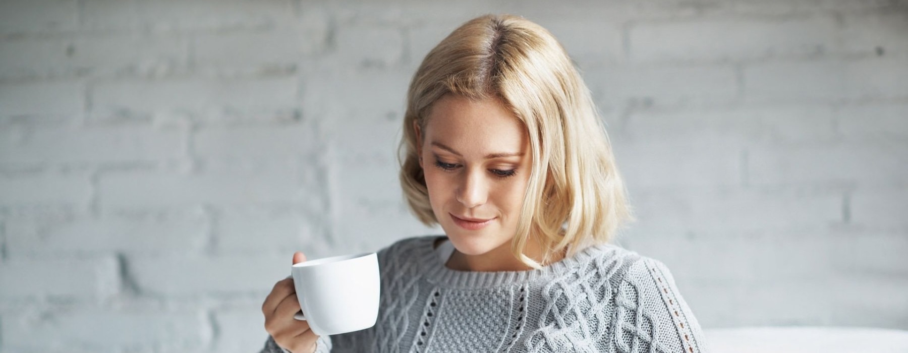 woman drinking coffee