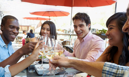 a group of people eating at a table